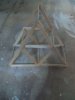 Reciprocal swived prism constraction